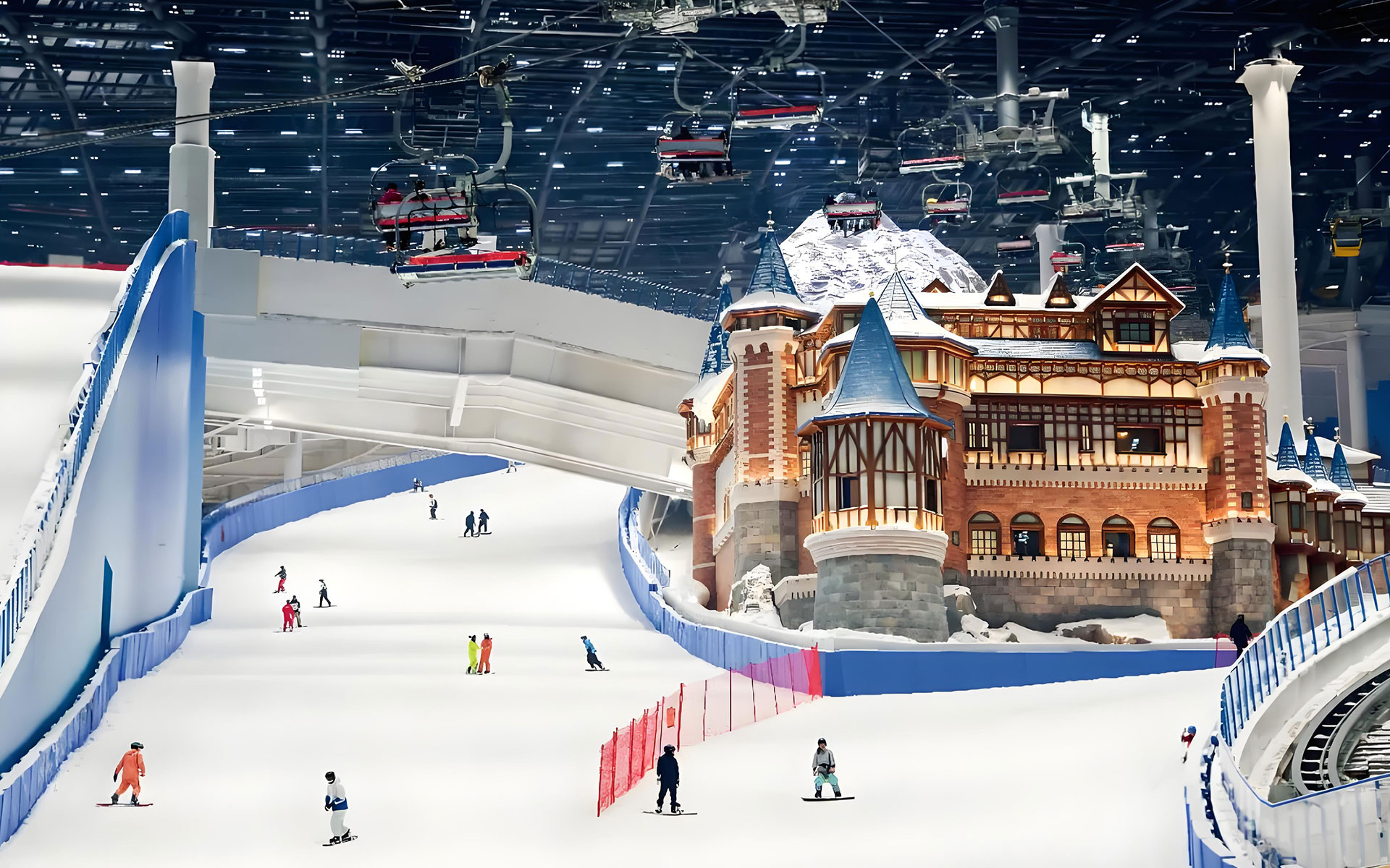 Indoor ski resort featuring artificial snow slopes, climate-controlled environments, and year-round skiing facilities.