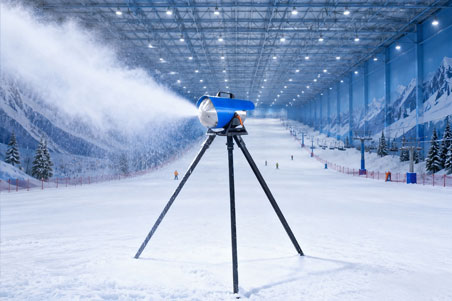 Indoor mobile snow machine providing efficient artificial snow production for snow parks, ski resorts, and indoor snow attractions.
