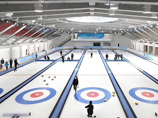 Curling rink with professional ice surface design, refrigeration system, and complete ice rink solutions for sports facilities and entertainment venues.